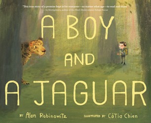 boy and a jaguar boy and a jaguar