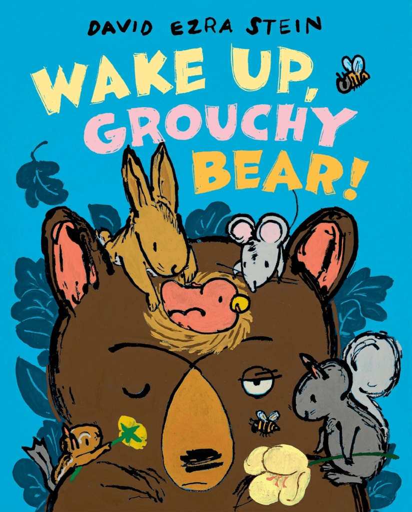 Cover image for Wake Up, Grouchy Bear by David Ezra Stein. Features a brown bear with one eye open, surrounded by small animals like a mouse, rabbit, and squirrel.