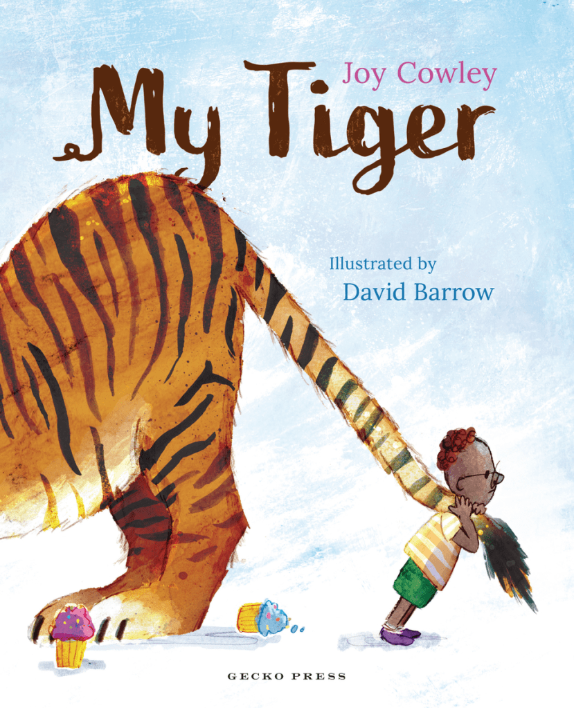 Cover image for My Tiger by Joy Cowley, illustrated by David Barrow. Features a small Black boy pulling the tail of a much larger tiger.